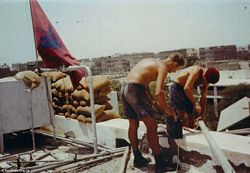 tn_Soldiers repairing Radio Mast at Fort Walsh.jpg (12357 bytes)