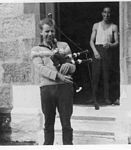 tn_Ballater 1964 - Jim Torrance with bagpipes.jpg (5650 bytes)