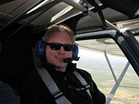 At the controls of the aircraft