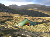 Campsite next to Loch nan Stuirteag on the Mine Mhr plateau, Cairn Toul in the background 